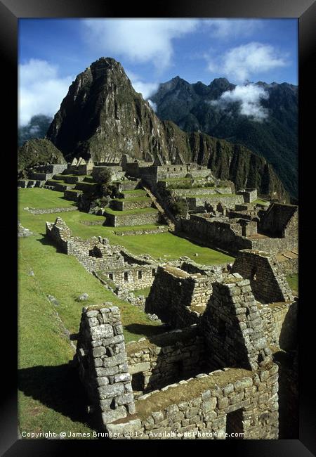 Inca House and Main Plaza in Machu Picchu Peru Framed Print by James Brunker