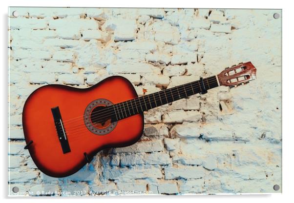Common Guitar On White Brick Wall Acrylic by Radu Bercan