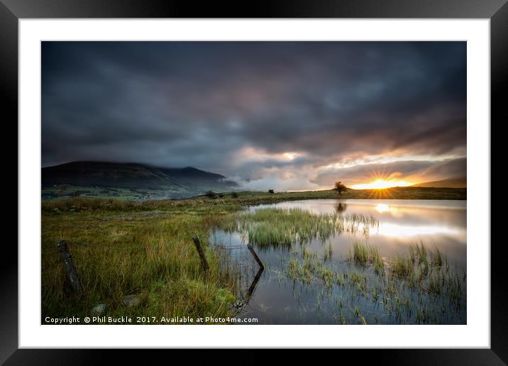 Sunrise at Tewet Tarn Framed Mounted Print by Phil Buckle