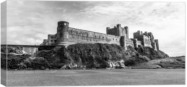 Majestic and Mighty Bamburgh Castle in Mono Canvas Print by Naylor's Photography