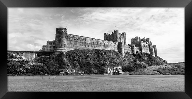 Majestic and Mighty Bamburgh Castle in Mono Framed Print by Naylor's Photography