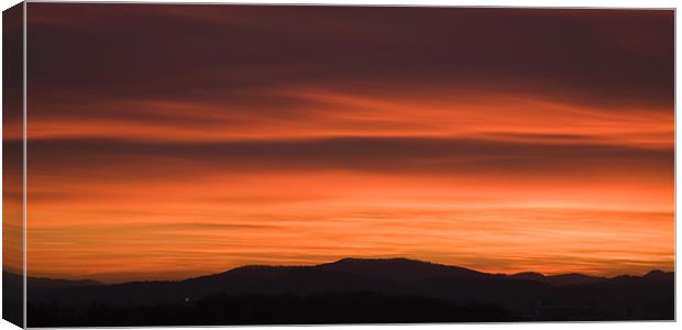Sunset over Ljubljana suburb Canvas Print by Ian Middleton