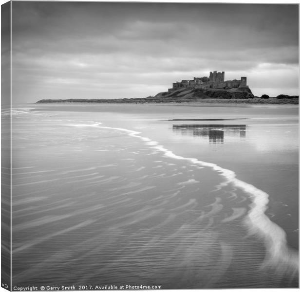 Bamburgh Castle in Mono. Canvas Print by Garry Smith