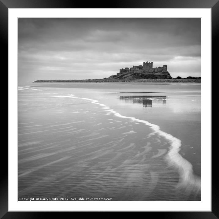 Bamburgh Castle in Mono. Framed Mounted Print by Garry Smith