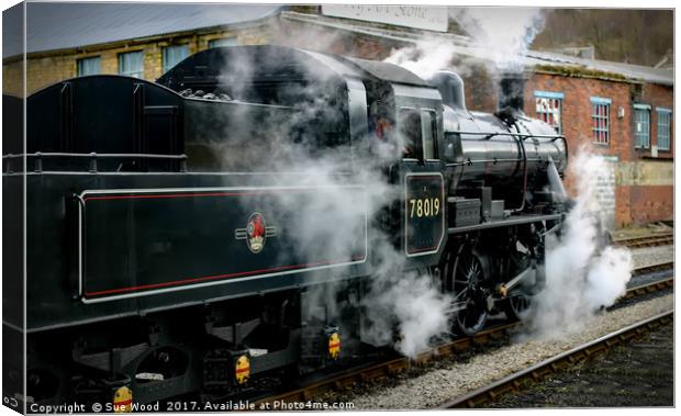 Steam train 78019 leaving Keighley Yorkshire Canvas Print by Sue Wood