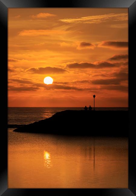Sunrise  silhouette  Framed Print by chris smith