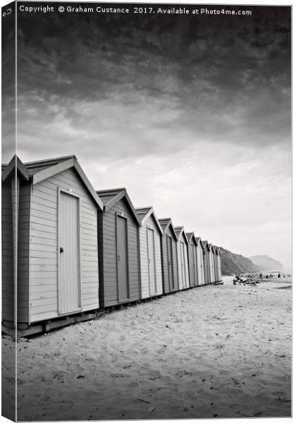 Charmouth Beach Huts Canvas Print by Graham Custance