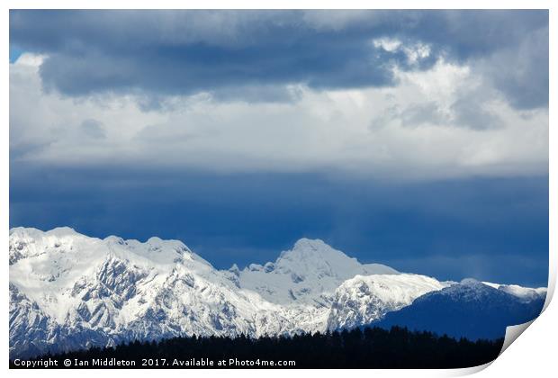 Fresh snow on the Kamnik Alps Print by Ian Middleton