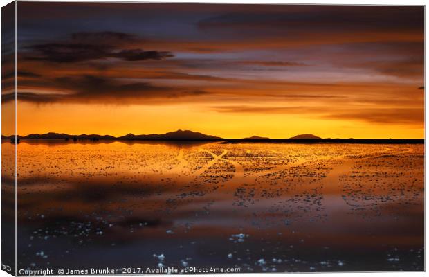 Golden Sunset on the Salar de Uyuni Bolivia Canvas Print by James Brunker