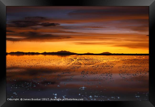 Golden Sunset on the Salar de Uyuni Bolivia Framed Print by James Brunker