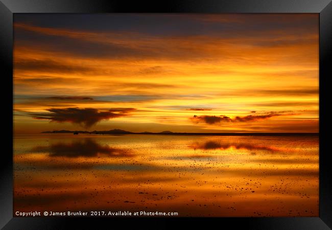 Sunset Reflections on the Salar de Uyuni Bolivia Framed Print by James Brunker