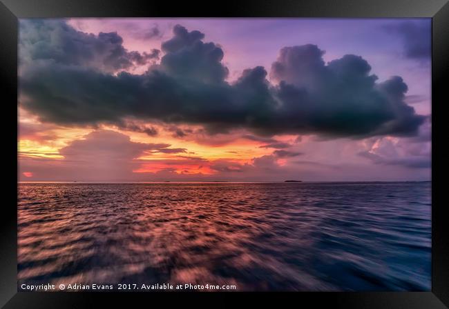 Cebu Straits Sunset Framed Print by Adrian Evans