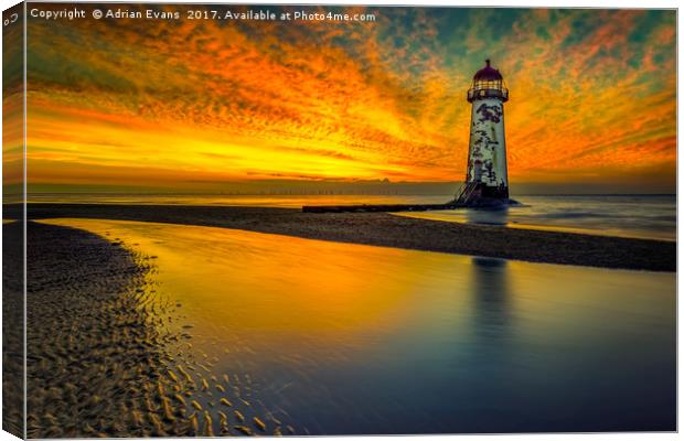 Evening Delight Talacre Lighthouse Canvas Print by Adrian Evans