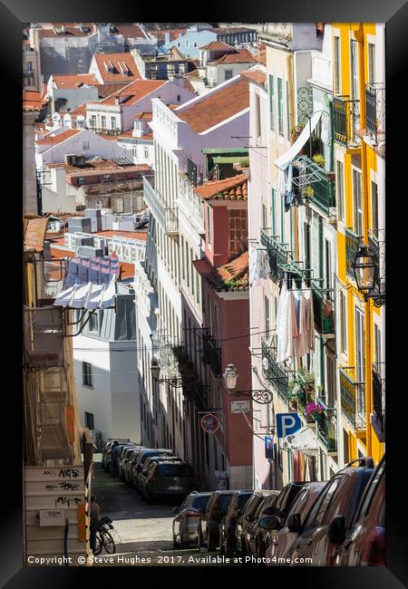 Steep Lisbon cobbled street Framed Print by Steve Hughes