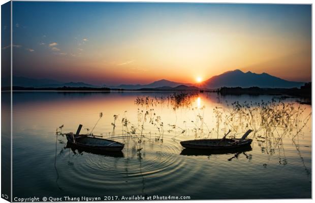 Sunset on the Dong Mo lake Canvas Print by Quoc Thang Nguyen