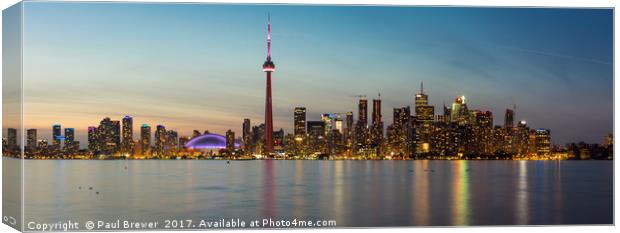 Toronto and the CN Tower at night Canvas Print by Paul Brewer
