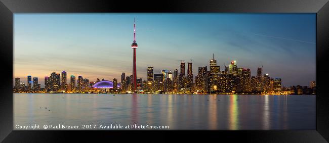 Toronto and the CN Tower at night Framed Print by Paul Brewer