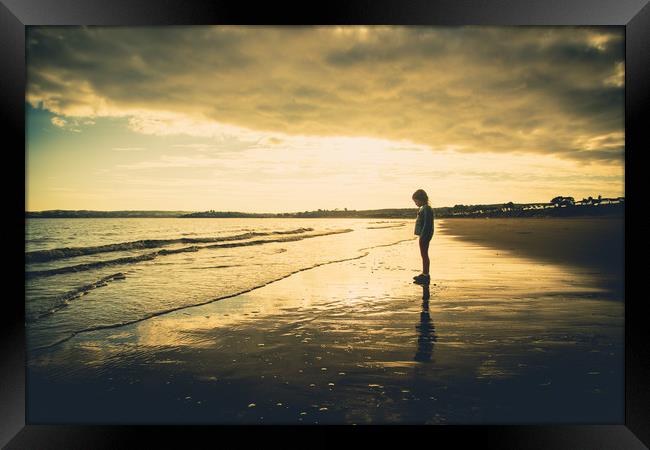 Alone on the shore Framed Print by Sean Wareing