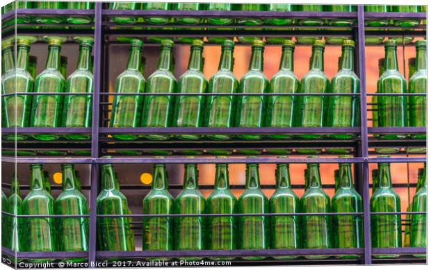 Empty green bottles Canvas Print by Marco Bicci