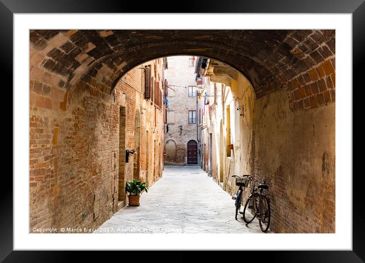 View of an alley in a Tuscan town Framed Mounted Print by Marco Bicci
