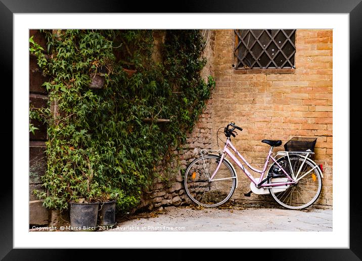 Bicycle leaning against a wall  Framed Mounted Print by Marco Bicci