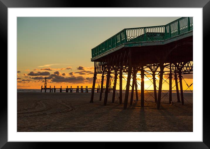 Under the Pier at Sunset Framed Mounted Print by Marg Farmer