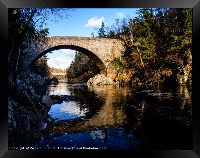 A bridge over the Findhorn river Framed Print by Richard Smith