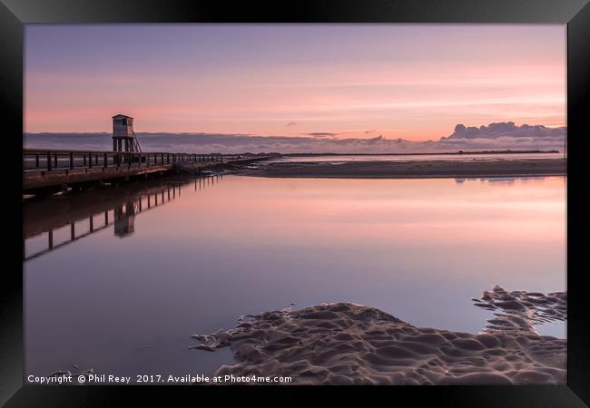 Sunrise at the causeway Framed Print by Phil Reay