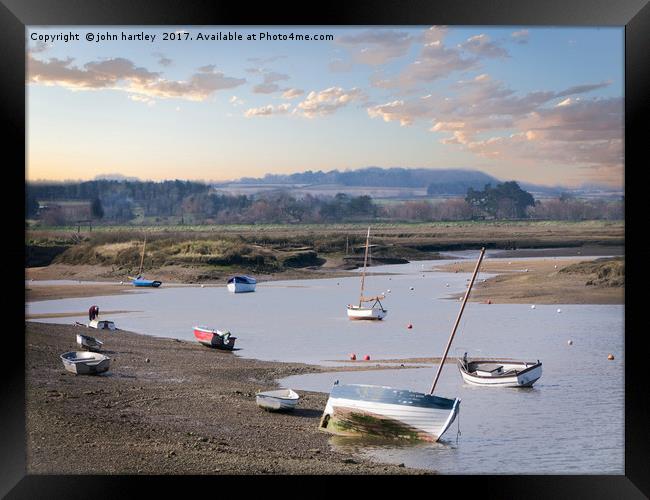 Sunset over an ebbing tide at Burnham Overy Staith Framed Print by john hartley