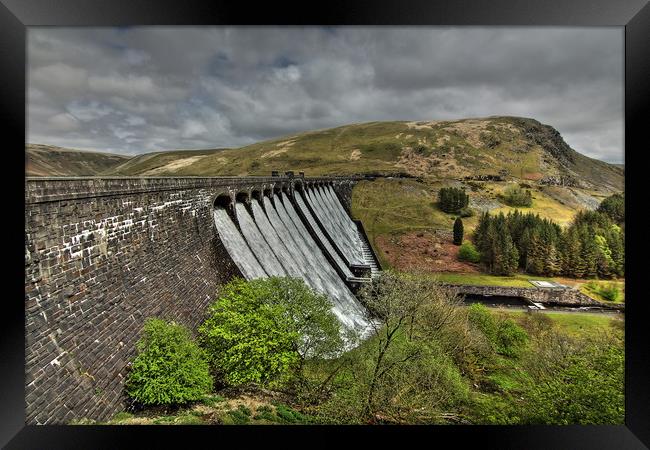 Claerwen Dam in May overflow Framed Print by Sorcha Lewis
