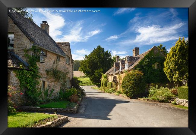 Old cotswold stone houses in Icomb Framed Print by Steve Heap