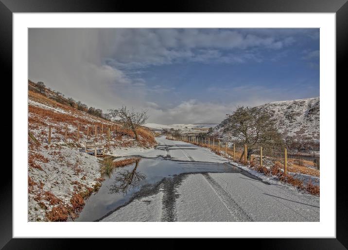 Road through the snow, Elan Valley Framed Mounted Print by Sorcha Lewis