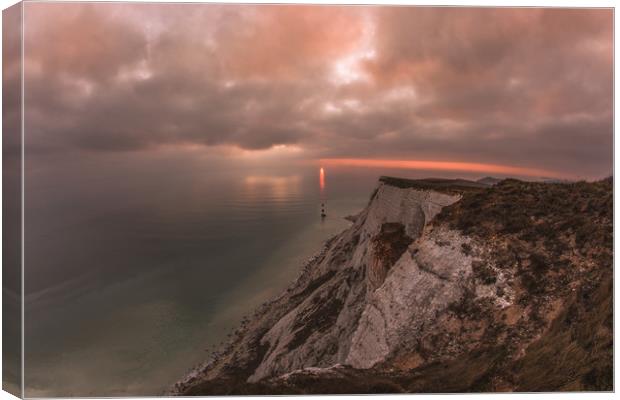 Beachy Head Sunsetting Directly behind the lightho Canvas Print by Daniel Frederick