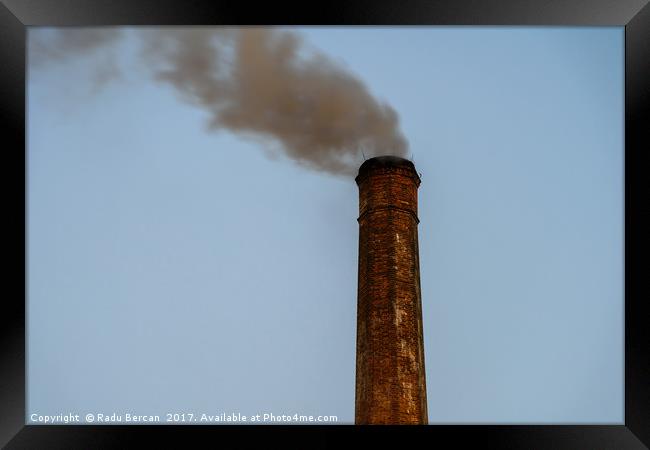 Industry Smoke Pollution From Factory Chimney Framed Print by Radu Bercan