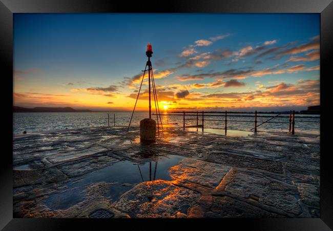 Sunrise over the Cobb  Framed Print by Ben Buller