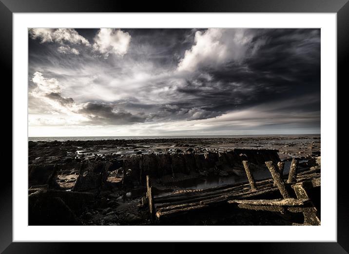 Storm clouds over beached shipwreck Framed Mounted Print by Simon Bratt LRPS
