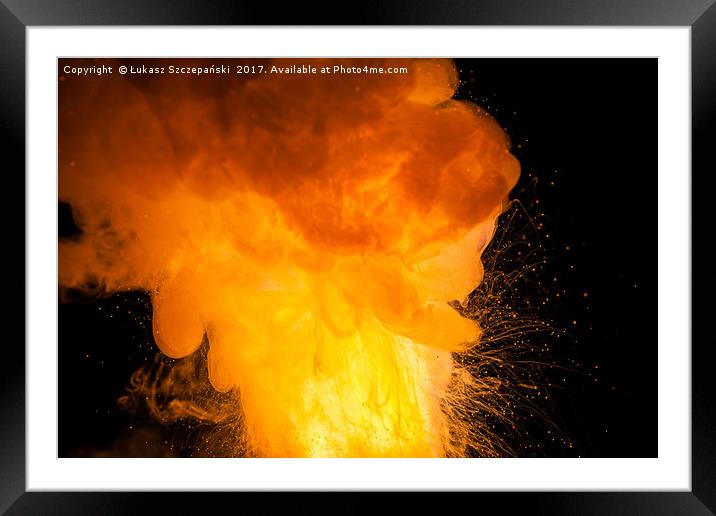 Realistic orange fire explosion on black backgroun Framed Mounted Print by Łukasz Szczepański