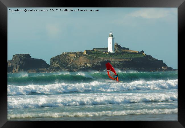 SURFER AT THE LIGHTHOUSE  Framed Print by andrew saxton