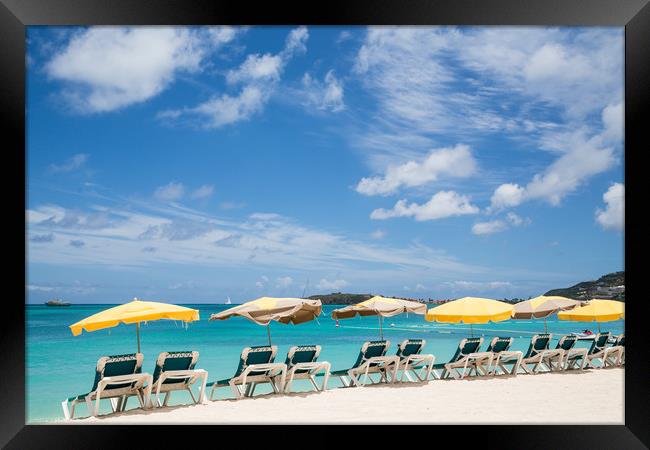 Chaise Lounges Under Umbrellas on Beach Framed Print by Darryl Brooks