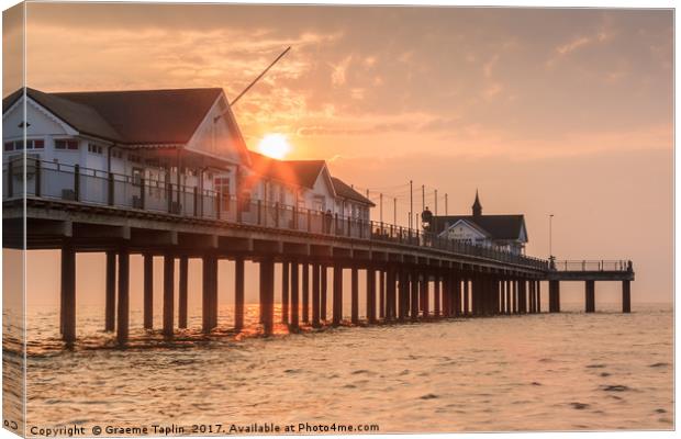 Sun rising over the Pier at Southwold, Suffolk Canvas Print by Graeme Taplin Landscape Photography