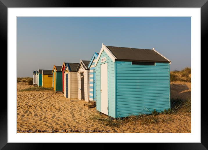 Colourful beach huts on the sand at Southwold  Framed Mounted Print by Graeme Taplin Landscape Photography