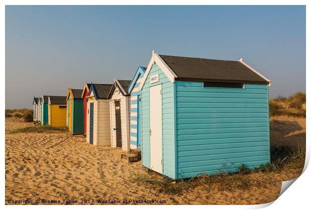 Colourful beach huts on the sand at Southwold  Print by Graeme Taplin Landscape Photography
