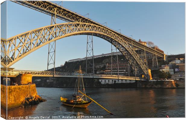 View of Porto bridge from the riverside Canvas Print by Angelo DeVal