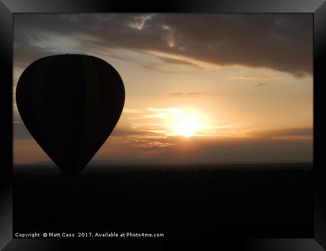 Photo of an Air Balloon with the sun setting over  Framed Print by Matt Cass