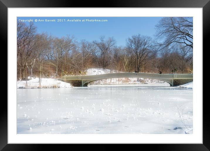 Bow Bridge in Central Park in the Snow Framed Mounted Print by Ann Garrett