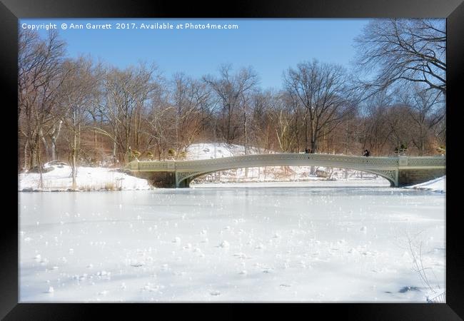 Bow Bridge in Central Park in the Snow Framed Print by Ann Garrett