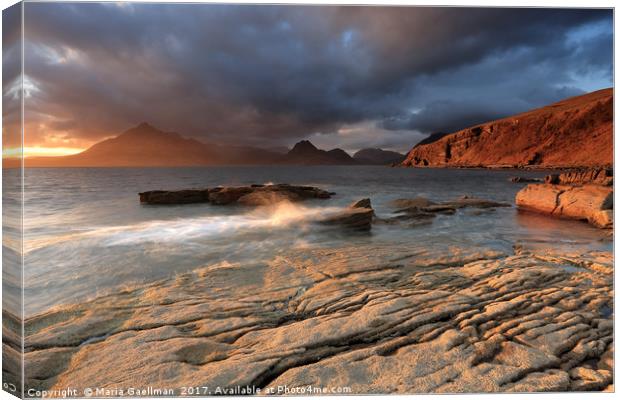 Splashing waves and the Cuillins at Sunset Canvas Print by Maria Gaellman