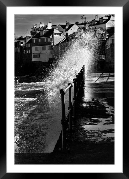 Winter sun and stormy sea Framed Mounted Print by Brian Spooner