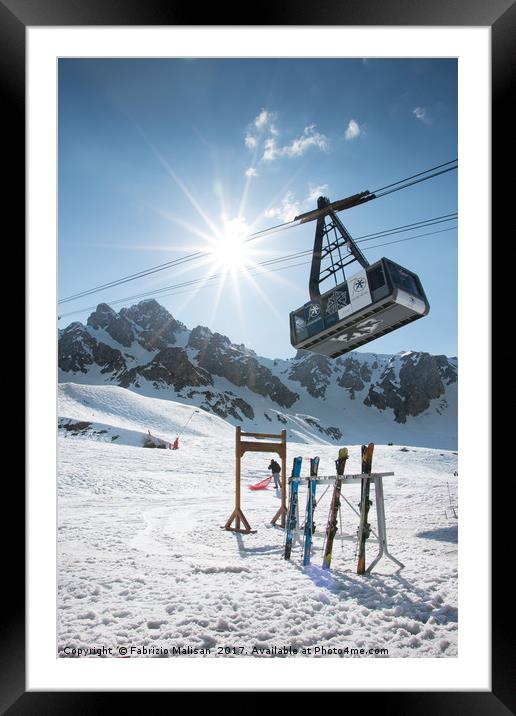 A big cablecar ride to the top of the mountain Framed Mounted Print by Fabrizio Malisan