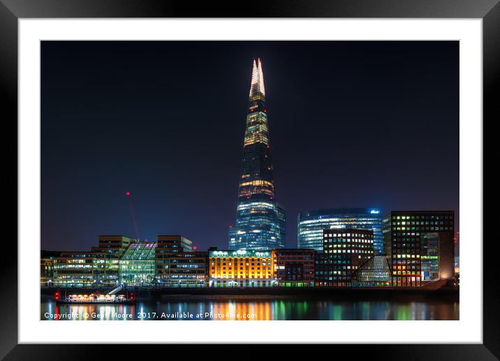 Dreaming In Neon - London Skyline at Night. Framed Mounted Print by Geoff Moore